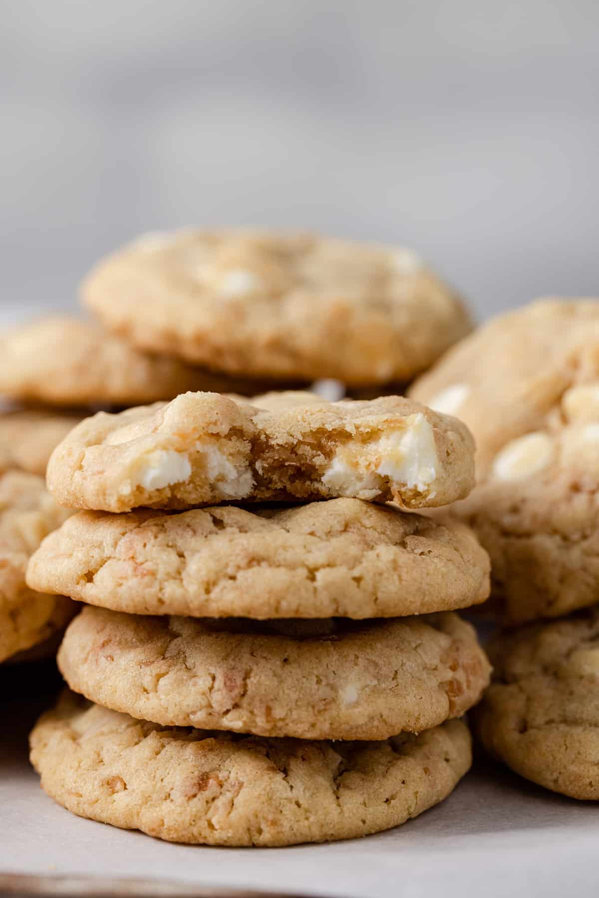 A stack of coconut white chocolate chip cookies