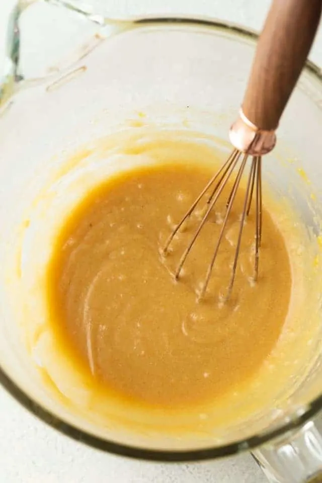 wet ingredients for butterscotch toffee cookies combined in a glass bowl