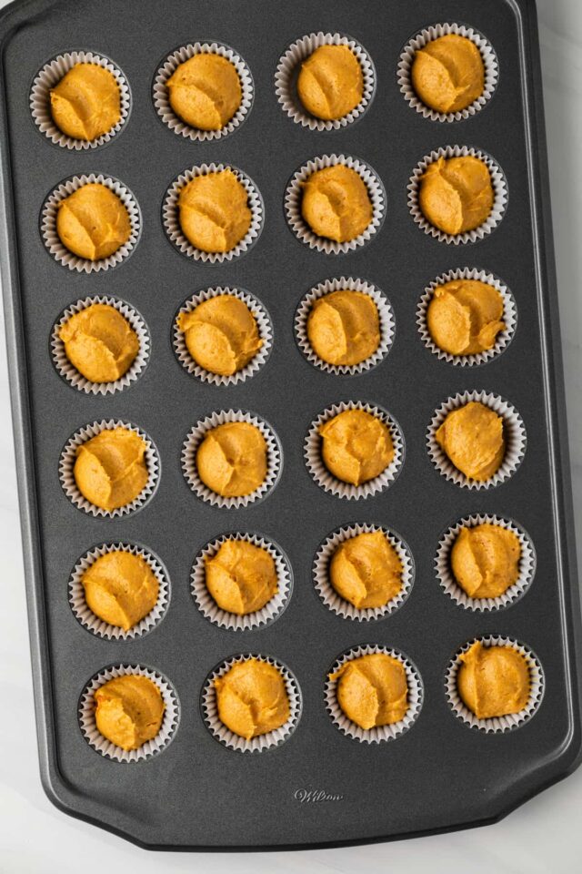 Mini pumpkin cupcakes ready to be baked