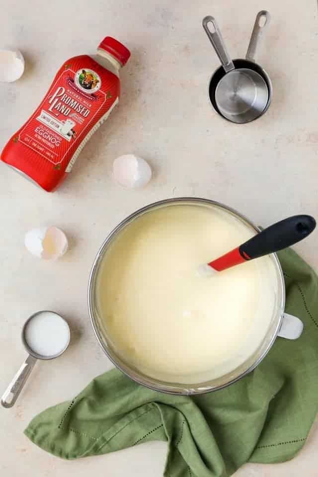 Eggnog cheesecake batter in a mixing bowl.