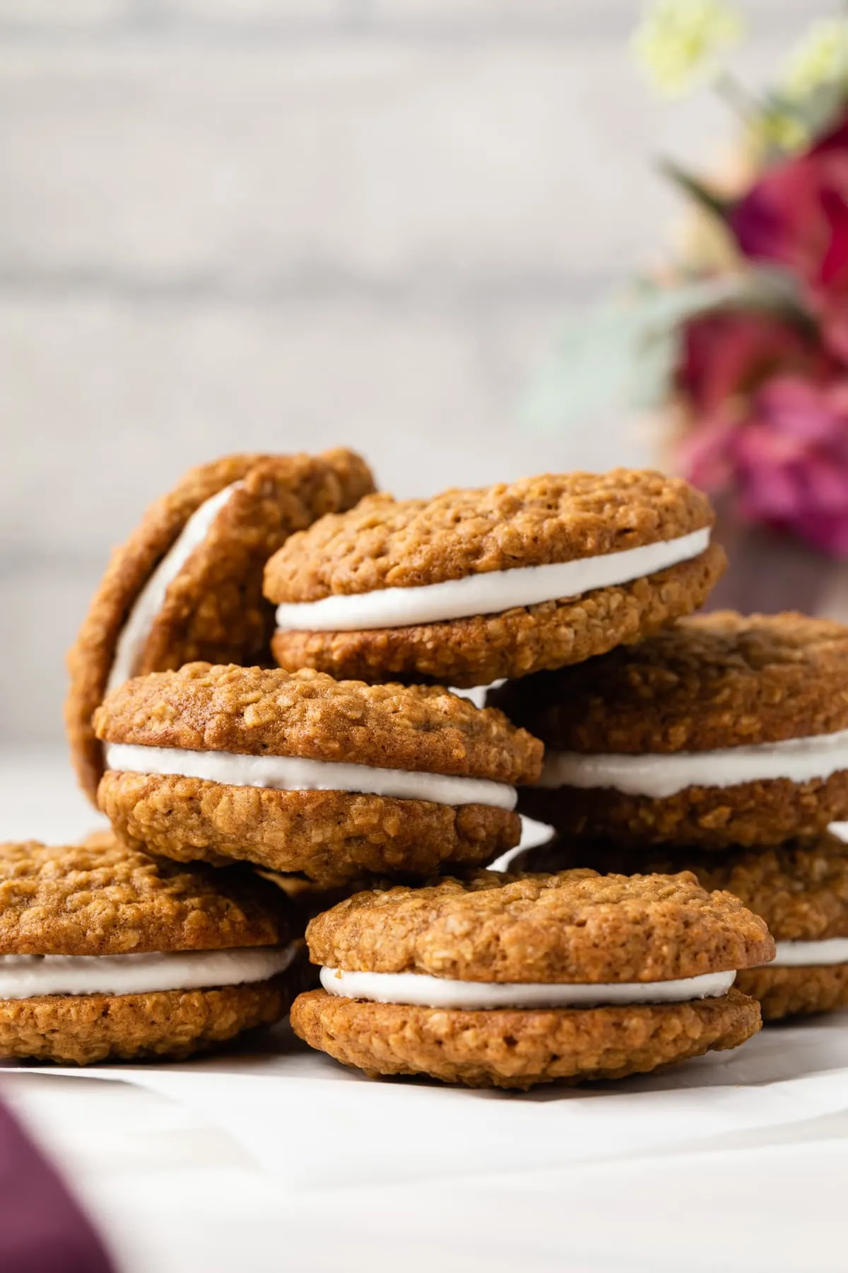 Oatmeal cream pies stacked on a tabletop.