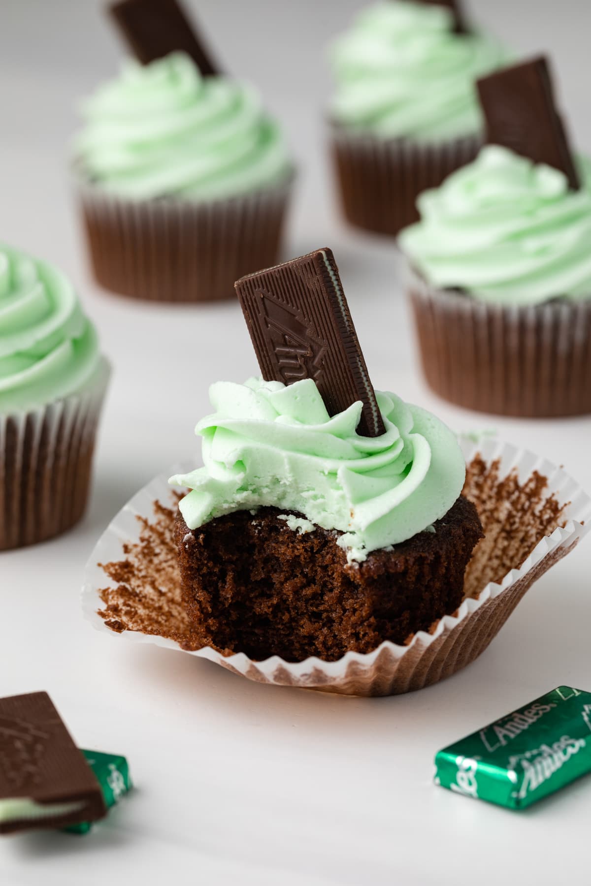Andes mint cupcake with a bite taken out.