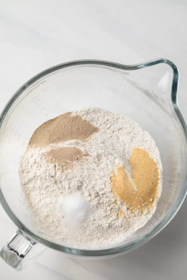 Dry ingredients in for breadsticks in glass bowl.