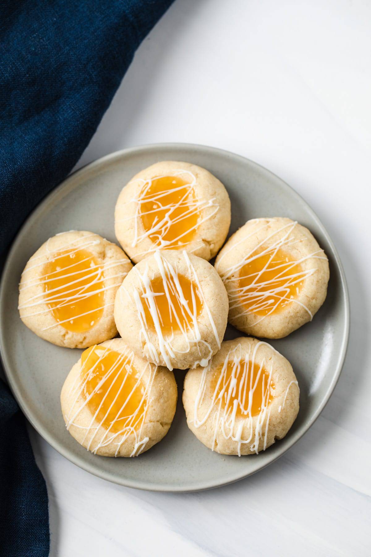 lemon filled cookies on a gray plate
