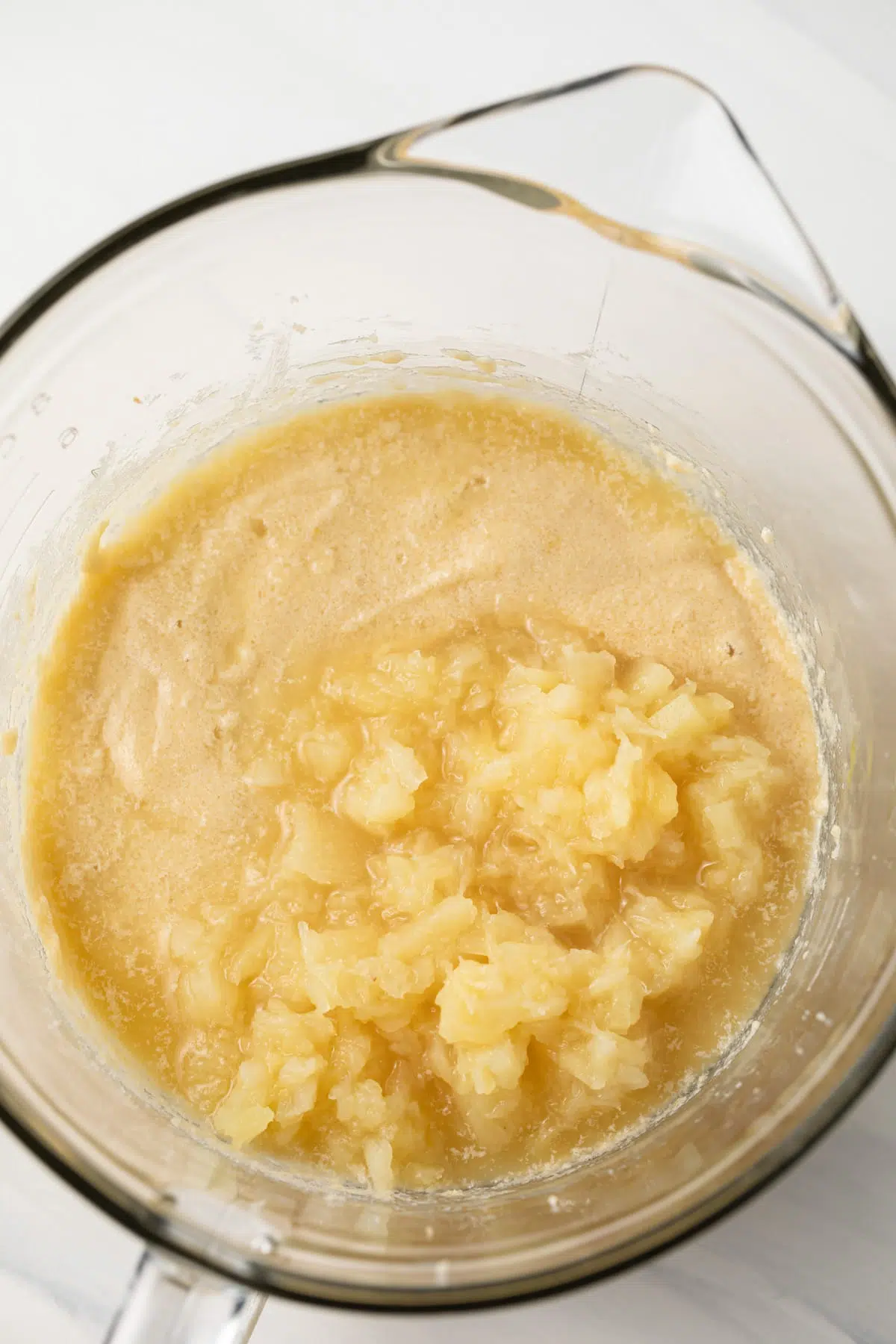 Crushed pineapple added to cupcake batter.