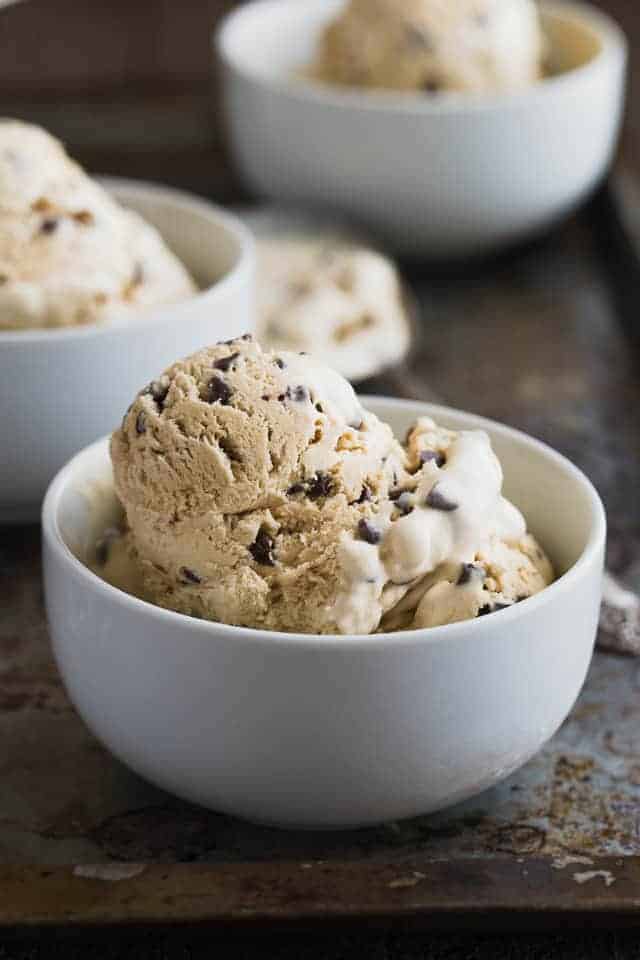 Coffee crunch ice cream in a white bowl.