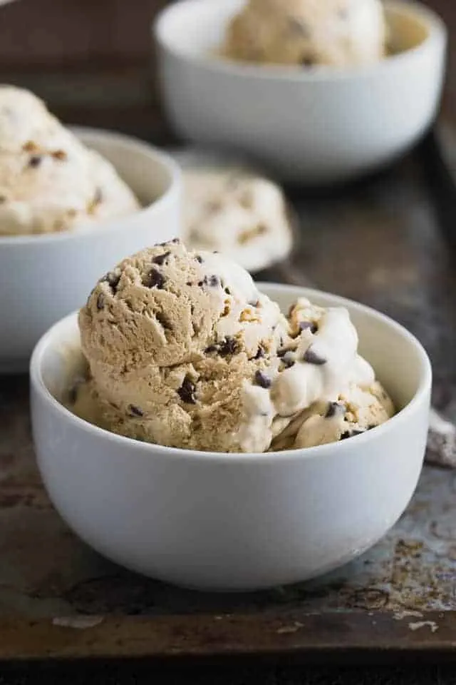 Coffee crunch ice cream in a white bowl.