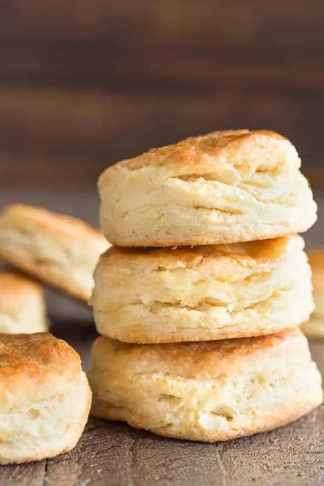 A stack of three honey cream cheese biscuits.