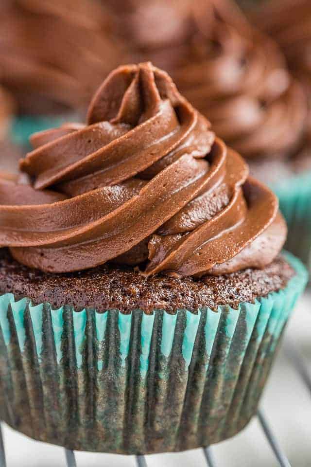 Front view of a chocolate zucchini cupcakes topped with chocolate frosting