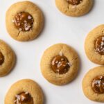 Overhead view of salted dulce de leche thumbprint cookies