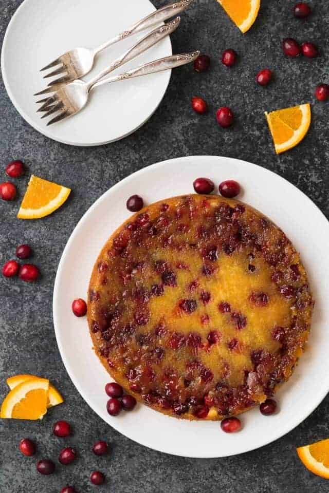 Inverted Cranberry Orange Upside Down Cake on a serving plate.