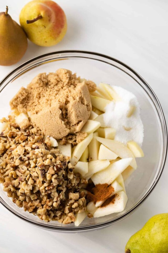 Pear walnut crisp filling ingredients in a bowl