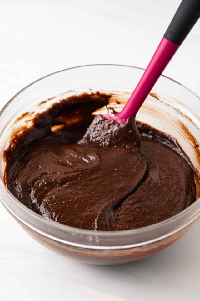 Triple chocolate brownie batter in a glass bowl