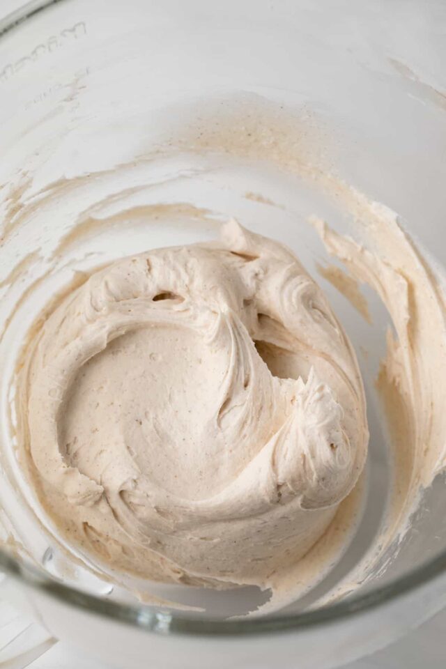 Cinnamon buttercream frosting in a mixing bowl