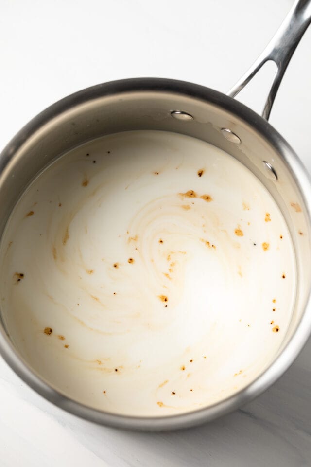 Milk and vanilla in a sauce pan.