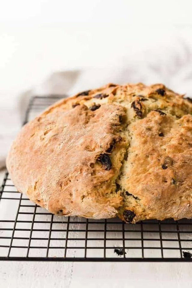 Front view of Irish soda bread on a wire rack.