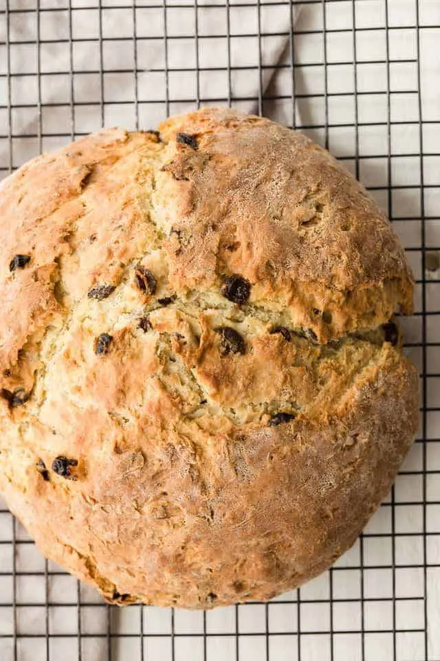 Overhead view of Irish soda bread on a wire rack.