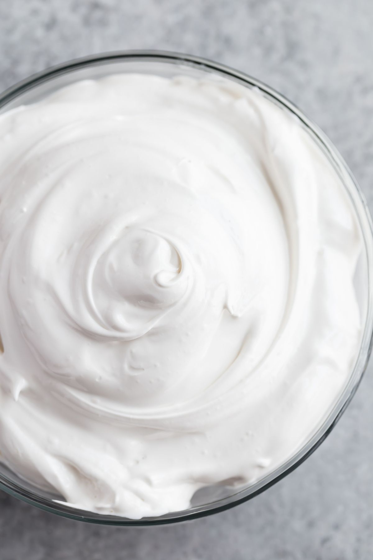 overhead view of Fluffy 7 Minute Frosting in a glass bowl.