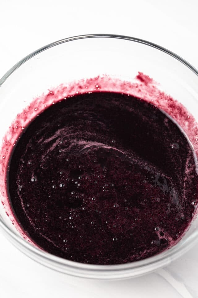 Seedless blackberry puree in glass bowl.