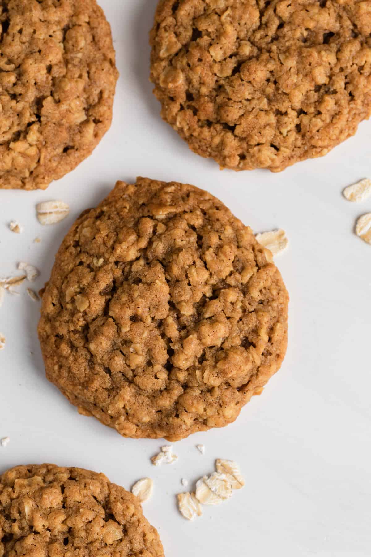 Close up of pumpkin oatmeal cookie on white background
