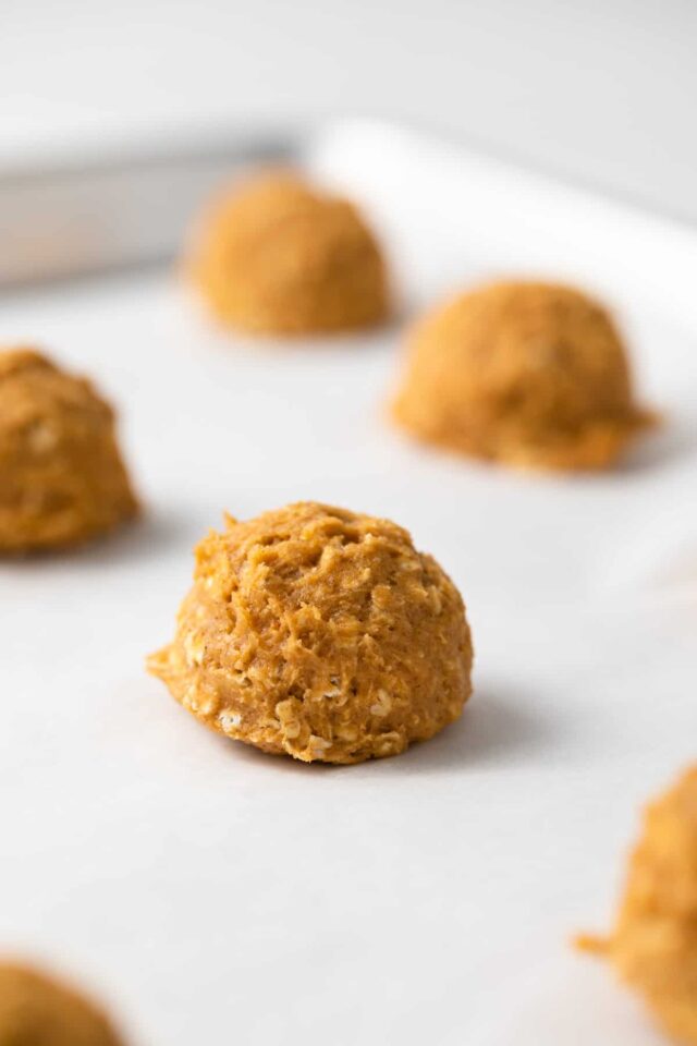 Balls of pumpkin oatmeal cookie dough