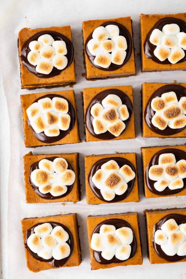 Pumpkin squares topped with chocolate ganache and toasted marshmallows
