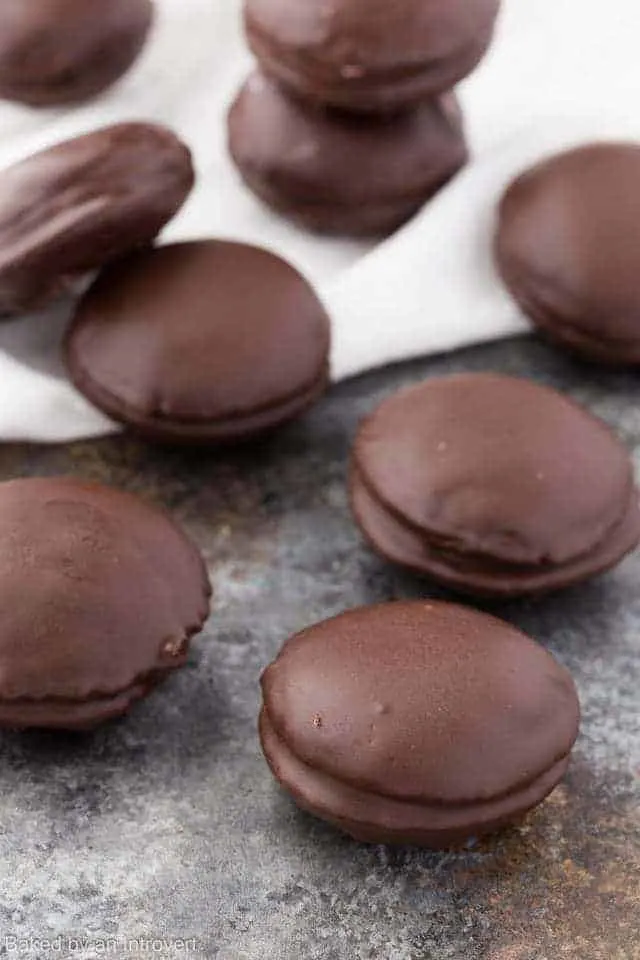 Homemade Moon Pies on a speckled background.