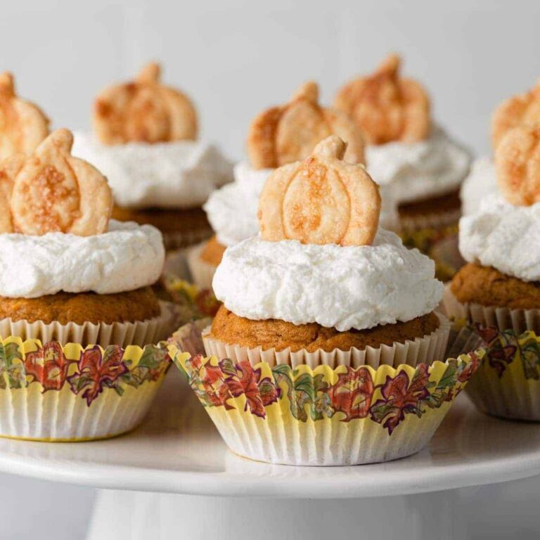 pumpkin pie cupcakes on a white cake stand