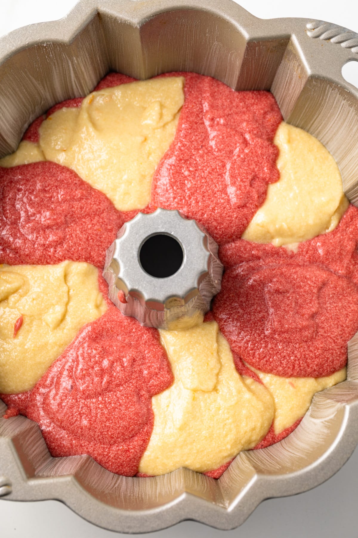 Cake batter in a bunt pan.