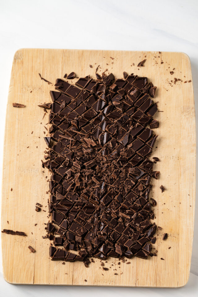 Chopped baking chocolate on a cutting board