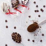Chocolate Espresso Spoons wrapped in treat bags and tied with red ribbon.