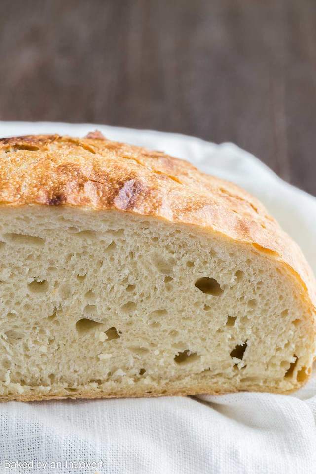 Close up view of half a loaf of slow cooker bread.