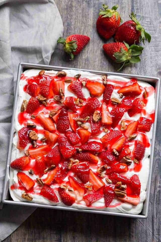 overhead view of Strawberries and Cream Icebox Cake in a square pan