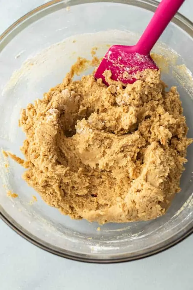 Peanut butter bar batter in a glass bowl.