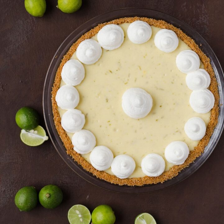 key lime cheesecake pie in glass dish