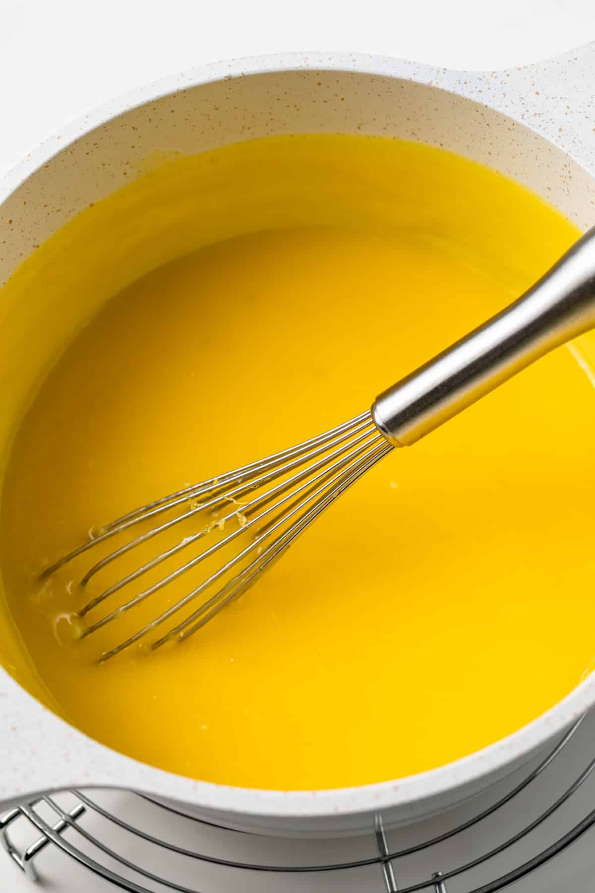 Lemon bar filling in a saucepan.