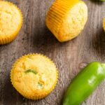 Angled view of Cheddar Jalapeño Cornbread Muffins.