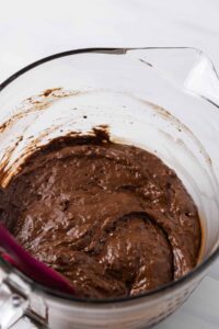 Chocolate donut batter in a mixing bowl