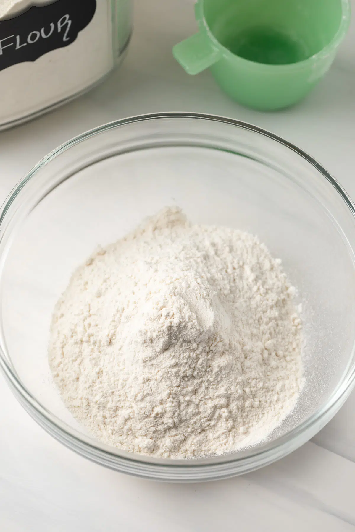 Homemade cake flour in glass bowl.