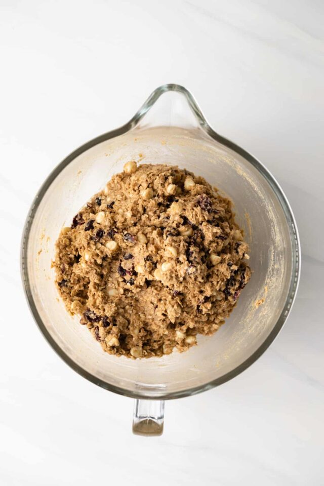 Cranberry white chocolate oatmeal cookie dough in a mixing bowl