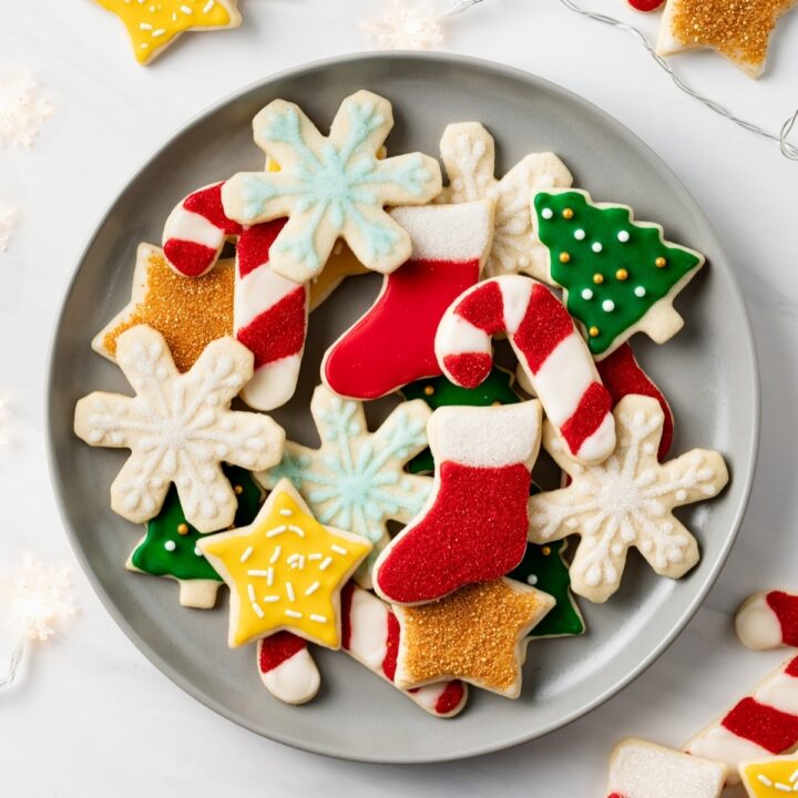decorated sugar cookies on grey plate