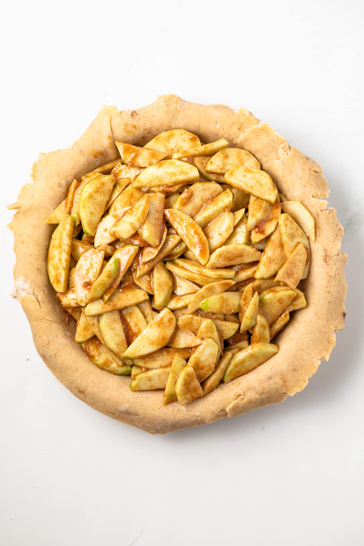 Apple filling in a pie shell.