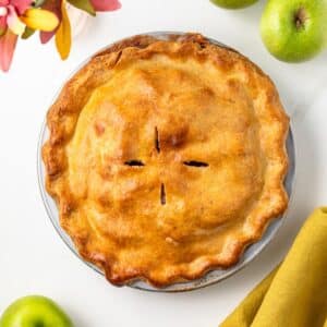 Overhead view of apple pie with brown butter crust.