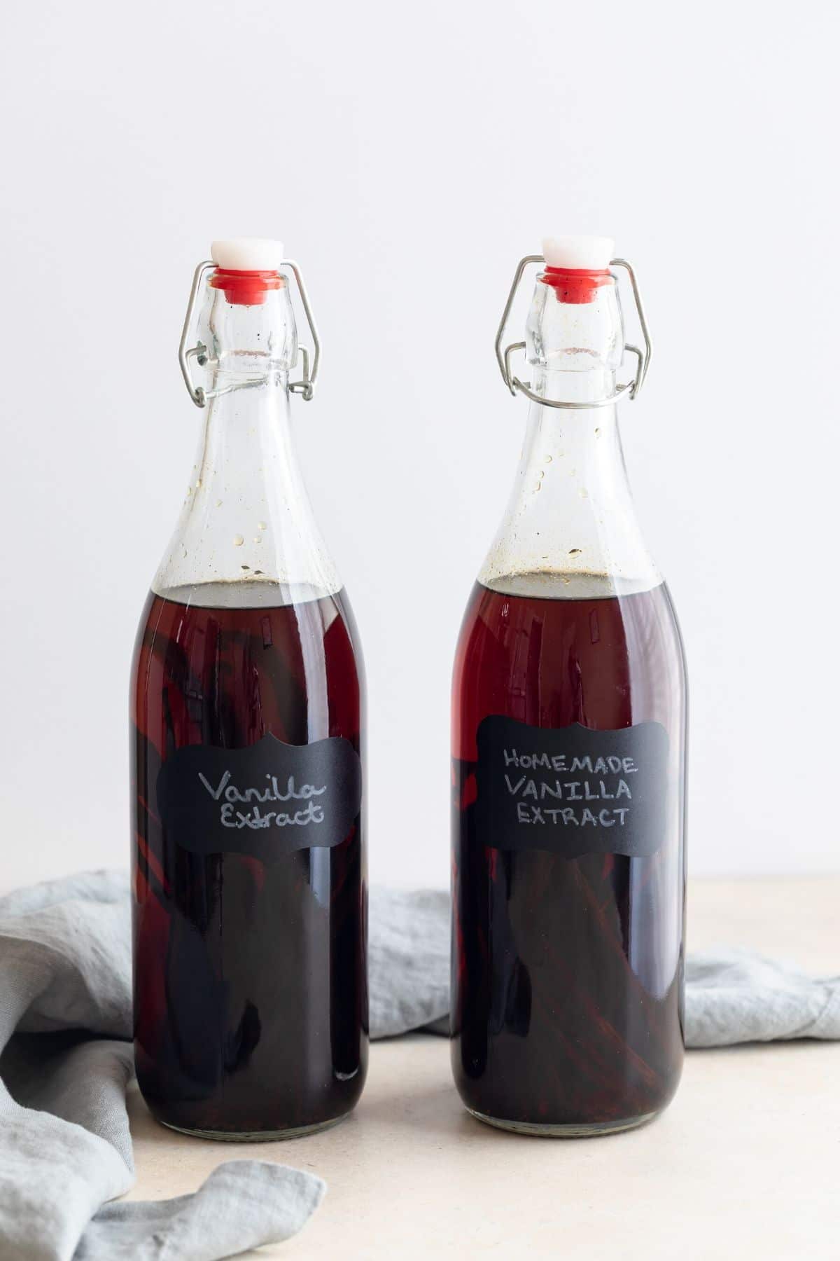 homemade vanilla extract in clear glass jars