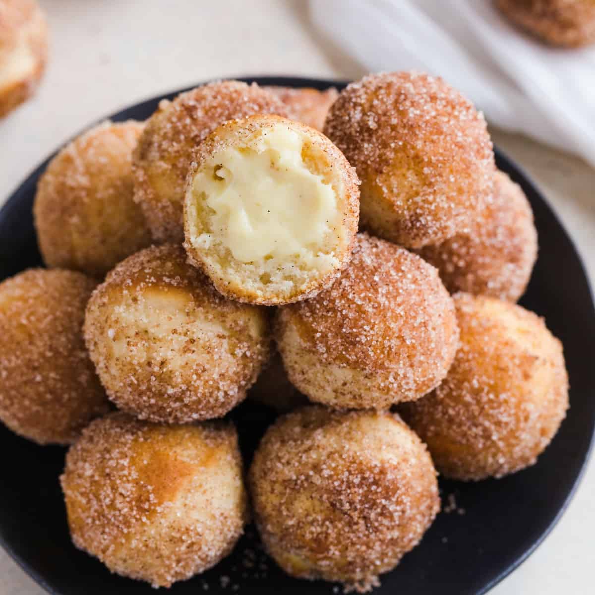 Baked Bunuelos with Anise Filling.