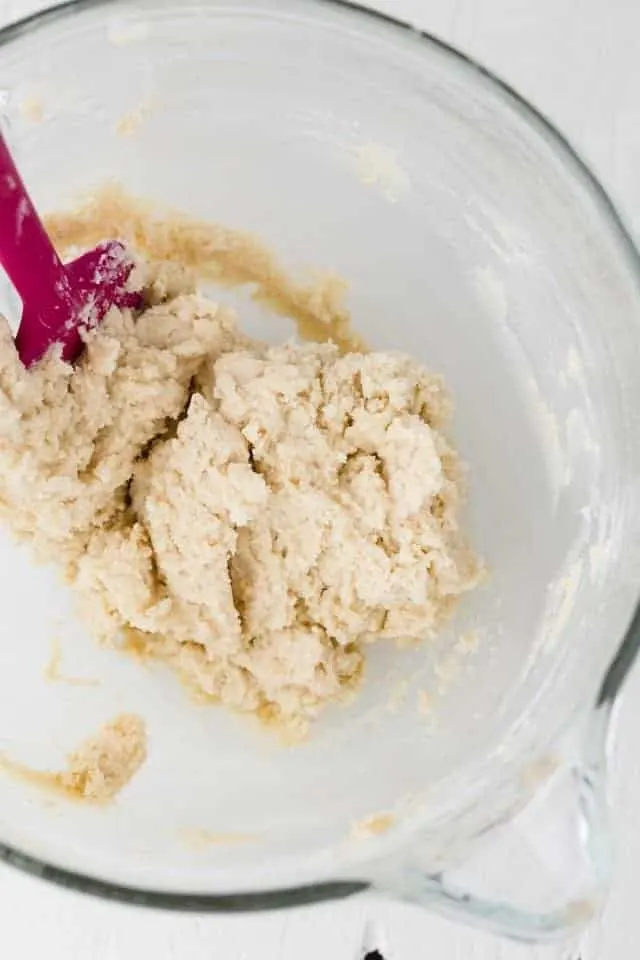 Ice Cream Sandwich Cookies Soft ice cream sandwich cookie dough in a glass mixing bowl with a pink spatula.
