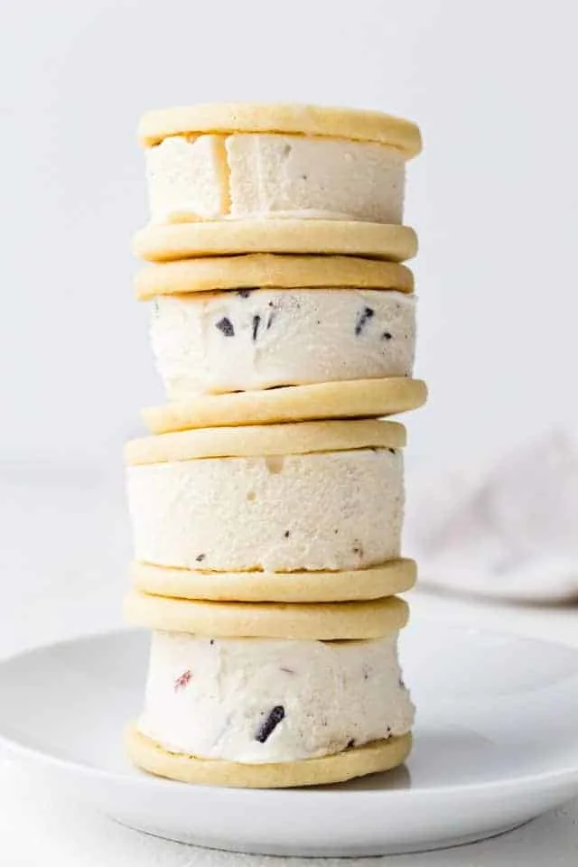 Ice Cream Sandwich Cookies http://www.beincooking.com/ Soft ice cream sandwich cookies stacked four high on a white plate.