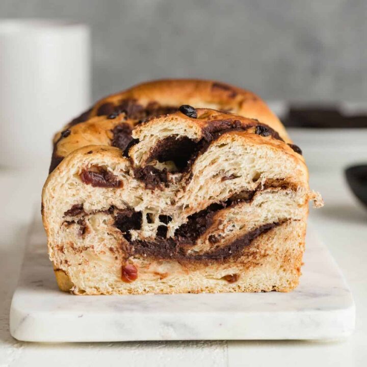 front view of chocolate swirl bread with cherries