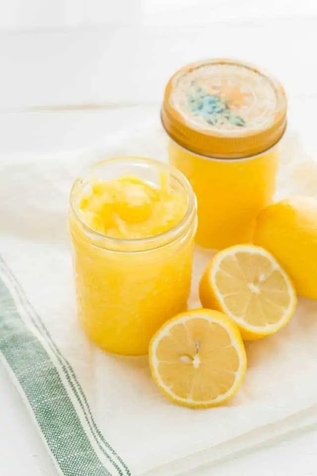 High angled view of Lemon Curd in glass jars.