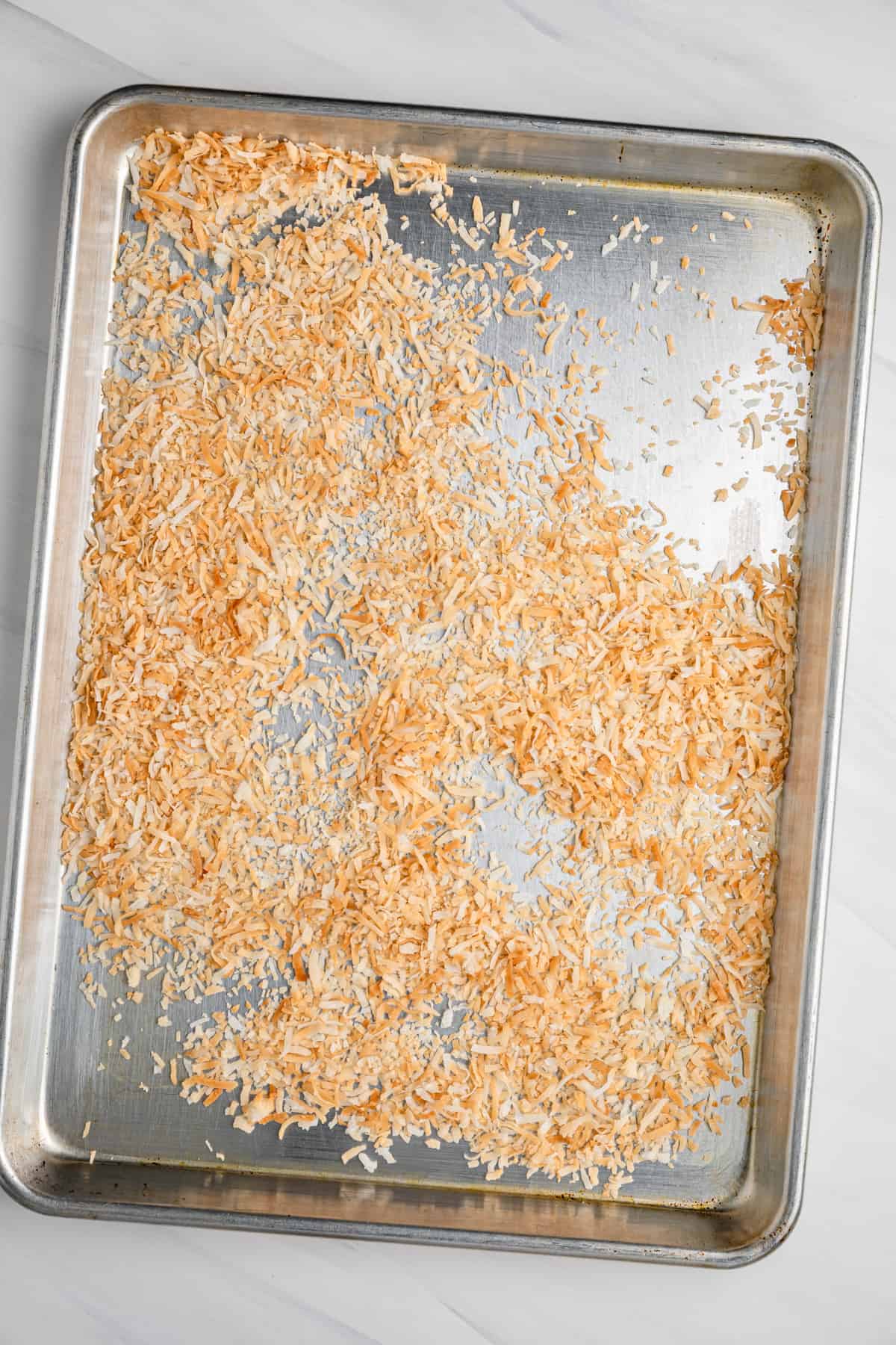 Toasted coconut on a baking sheet